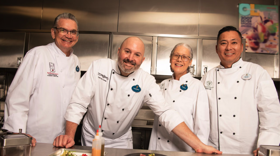 four chefs and white coats